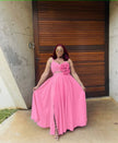 Light pink maxi dress with floral waist applique, sleeveless sweetheart bodice, slit hem