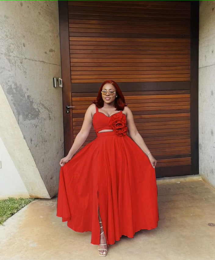 Red maxi dress with floral waist applique, sleeveless sweetheart bodice, slit hem