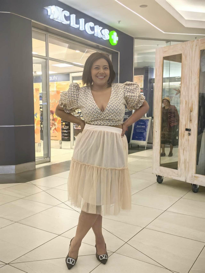 Geometric Pattern V-Neck Twin Set with Pleated Midi Skirt