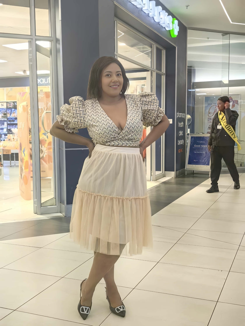 Geometric Pattern V-Neck Twin Set with Pleated Midi Skirt