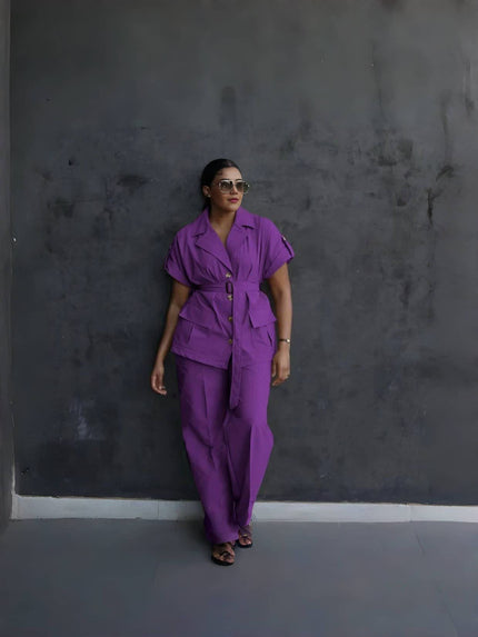 Purple belted lapel pantsuit with button-front short-sleeve jacket and loose matching trousers