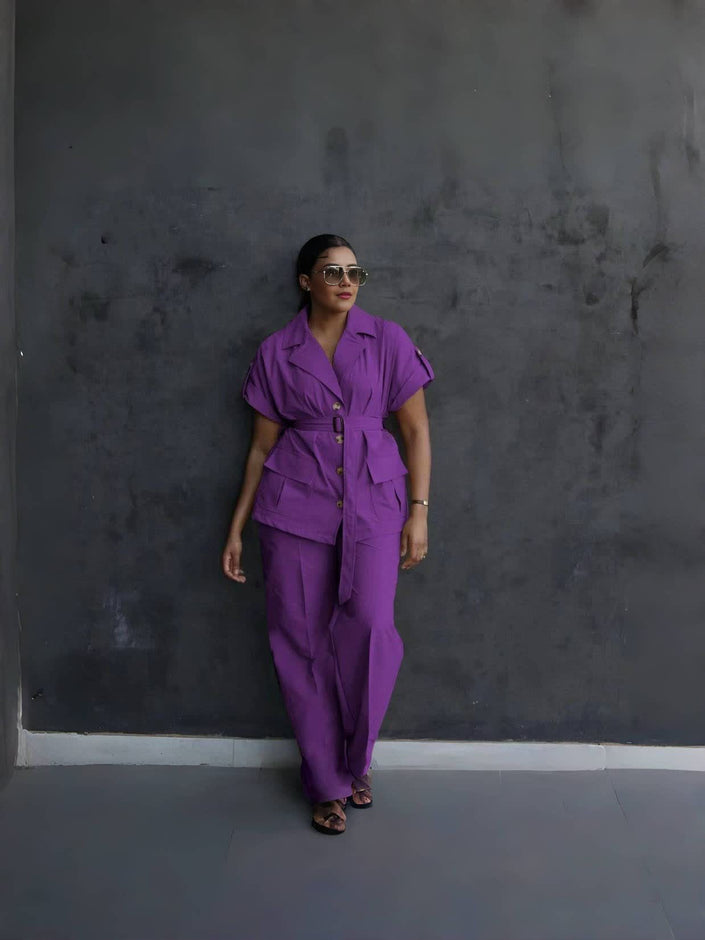 Purple belted lapel pantsuit with button-front short-sleeve jacket and loose matching trousers