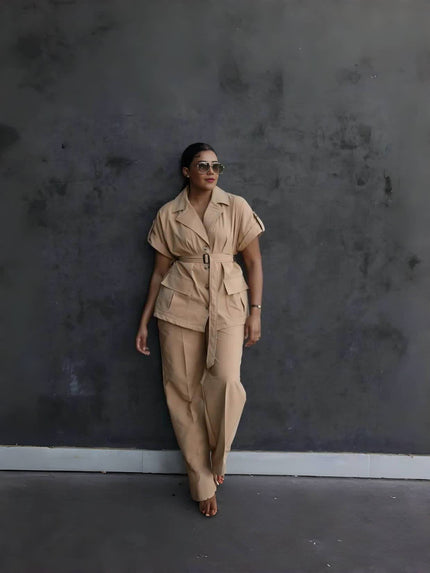 Nude belted lapel pantsuit set with button-front jacket and matching loose trousers