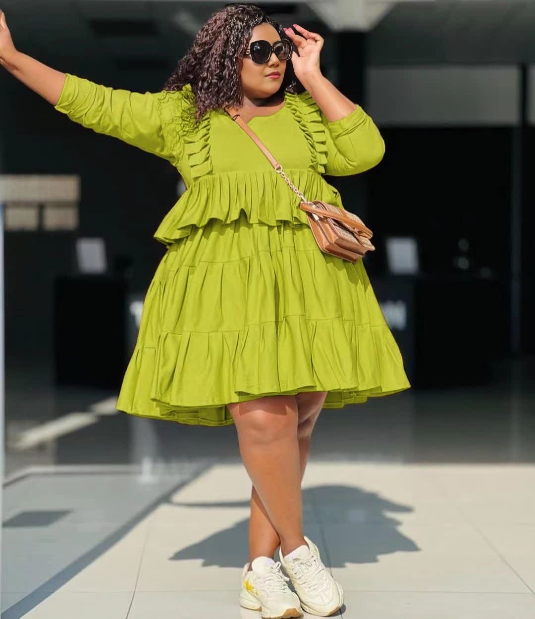 Tiered mini dress in lime green, long sleeves, ruffle layers, gathered bodice