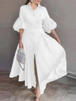 White puff-sleeve belted maxi dress with button-up V-neck and flowing skirt
