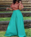 Two-piece geometric ruffle top and turquoise flared maxi skirt, tied waist detail