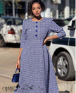 Blue geometric African-print midi dress with tie waist, button front and flared A-line