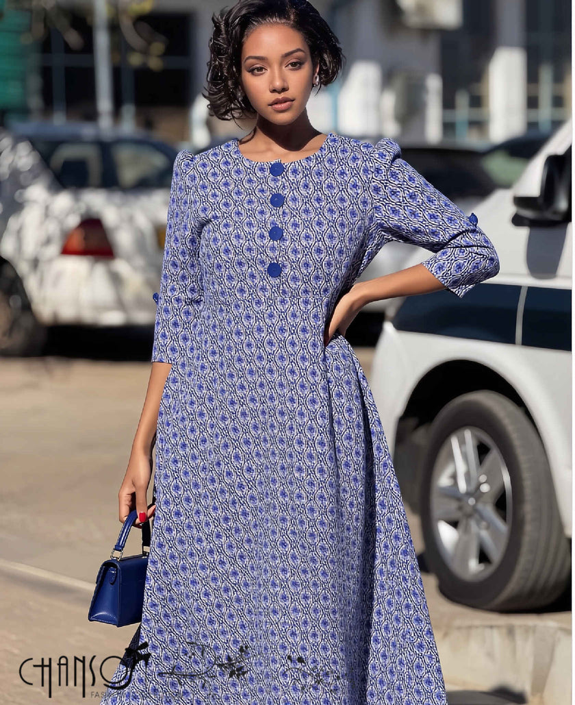 Blue geometric African-print midi dress with tie waist, button front and flared A-line