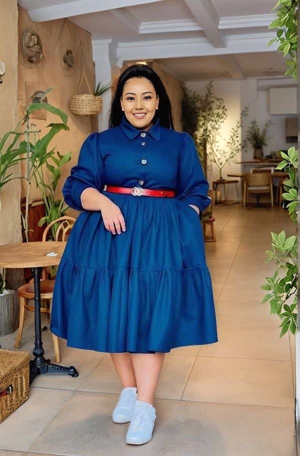 Blue tiered midi dress with red belt, long sleeves, buttoned collar and front buttons