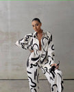 Printed shirt and wide-leg pants set, white with black abstract pattern