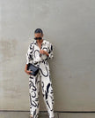 Printed shirt and wide-leg pants set, white with black abstract print, long sleeves