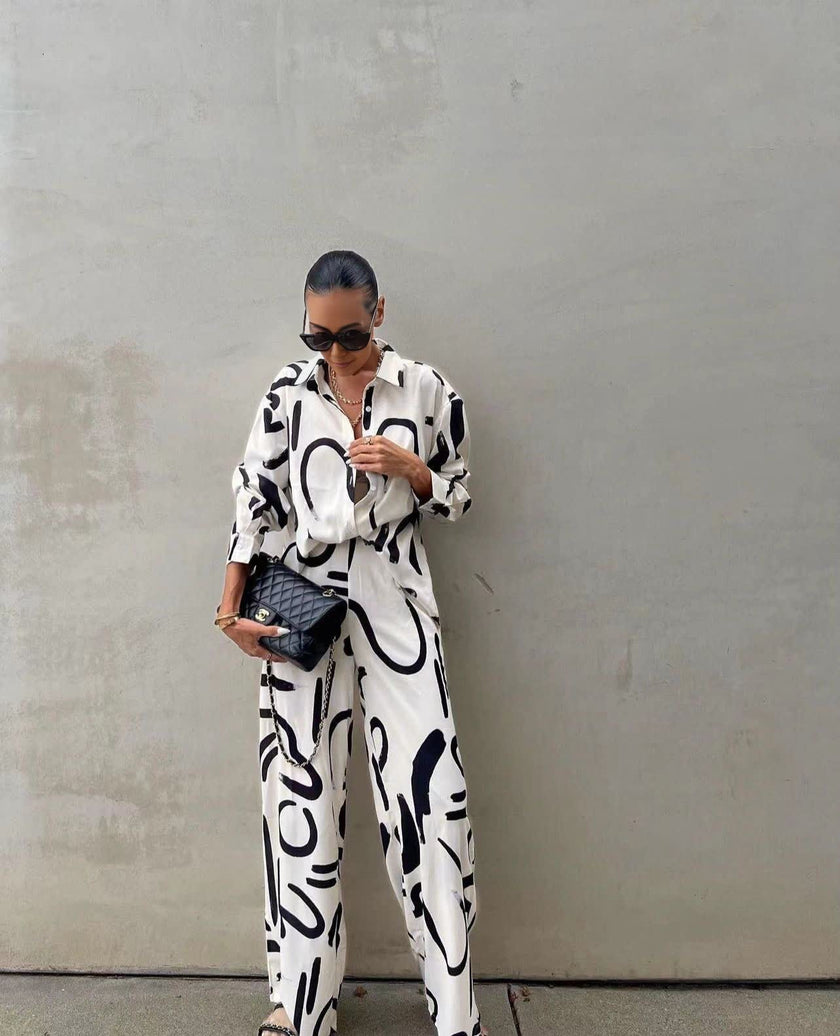 Printed shirt and wide-leg pants set, white with black abstract print, long sleeves