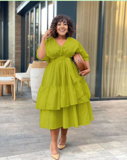 Lime green tiered midi dress with puff sleeves and V-neck, gathered waist