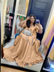 Tan puff-sleeve ruffle maxi dress, relaxed fit; V-neck and gathered ruffle hem