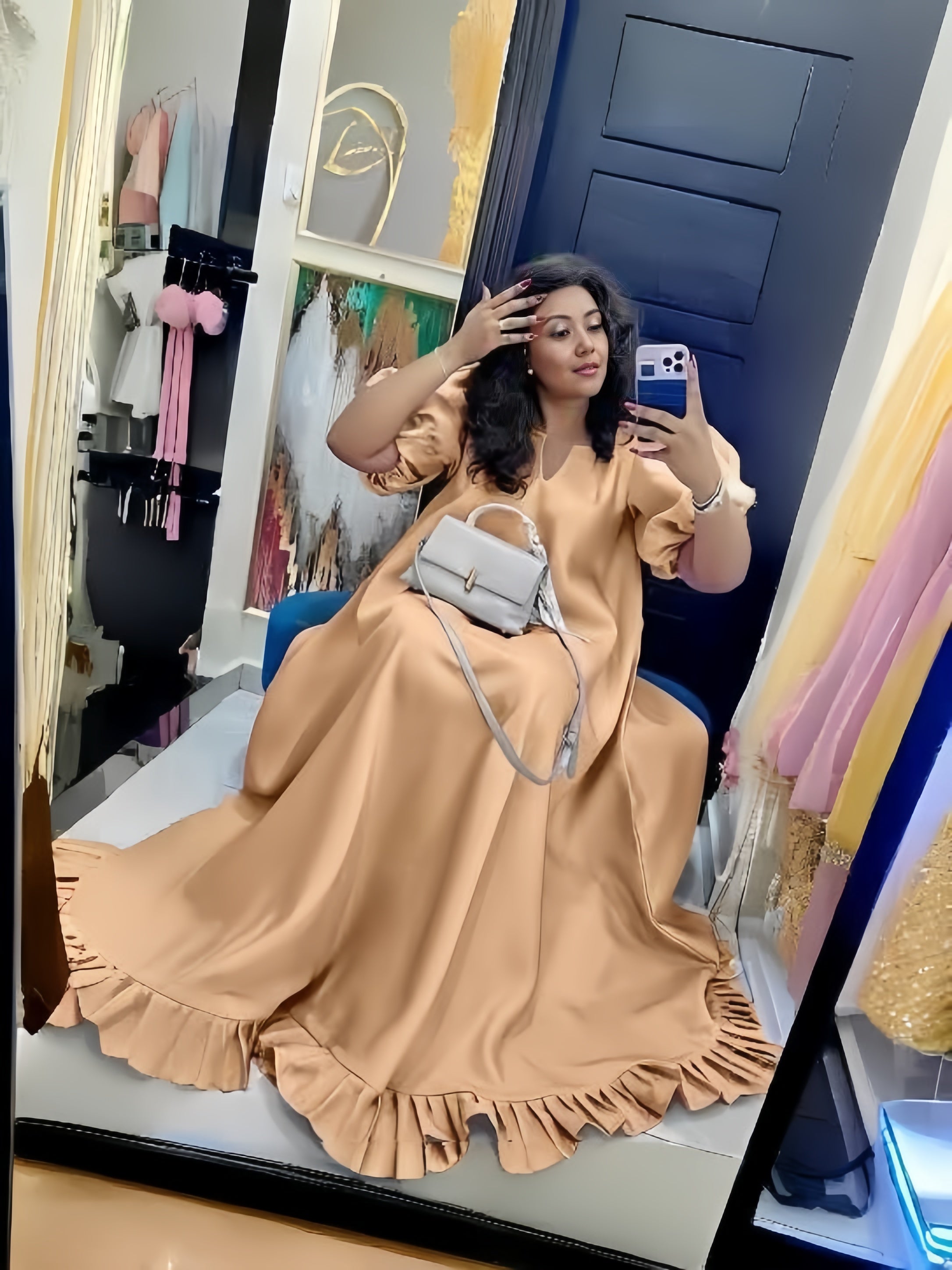 Tan puff-sleeve ruffle maxi dress, relaxed fit; V-neck and gathered ruffle hem
