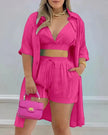Deep pink three-piece set with V-neck crop top, drawstring shorts, open button shirt