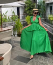 Green tiered maxi dress with puff sleeves, ruffled skirt and V-neckline