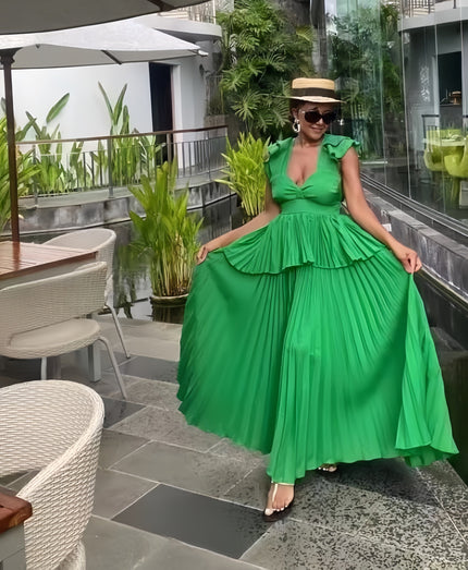 Green tiered maxi dress with puff sleeves, ruffled skirt and V-neckline