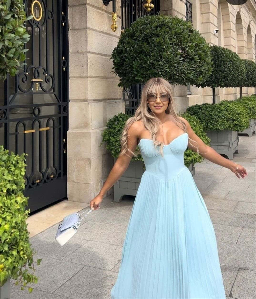 Light blue strapless sweetheart pleated maxi dress with full, pleated skirt
