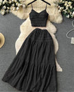Black smocked camisole crop top and pleated maxi skirt set