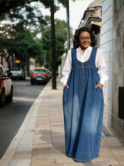 Blue sleeveless denim maxi dress with wide straps and gathered bodice