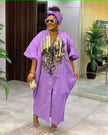 Plus size kaftan dress in violet with V-neck and gold floral-pattern front