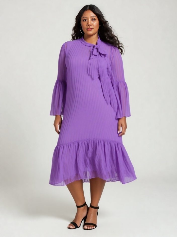 Purple pleated midi dress with neck tie, puff sleeves, and ruffle hem
