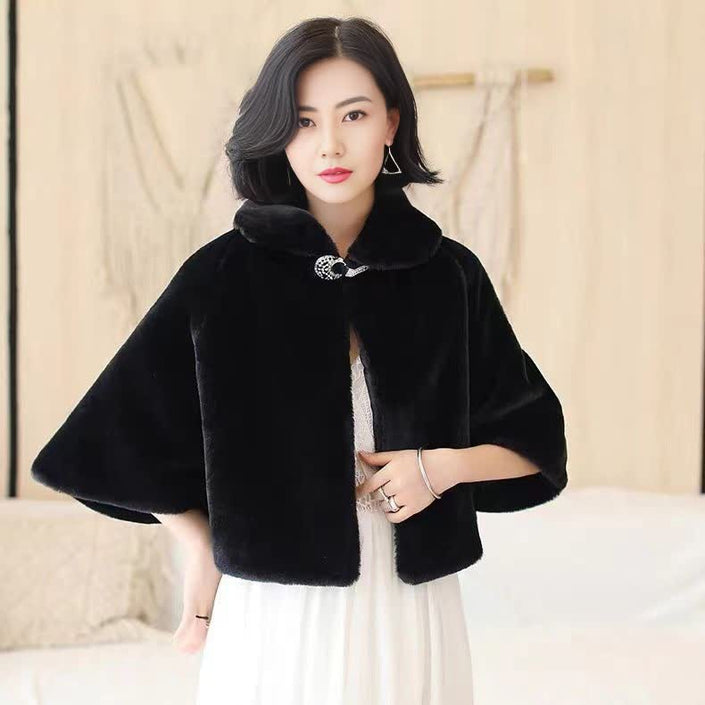 Black cape with bow clasp, short sleeves, high collar