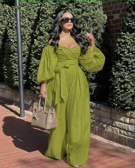 Yellow-green off-shoulder jumpsuit with puff sleeves, ruched bodice, and wide-leg pants