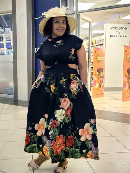 Black floral midi dress with pleated skirt and short sleeves