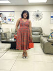 Sleeveless red plaid checkered midi dress with flared skirt and fitted waist