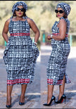 Sleeveless midi dress with blue-and-white geometric print and red contrast trim
