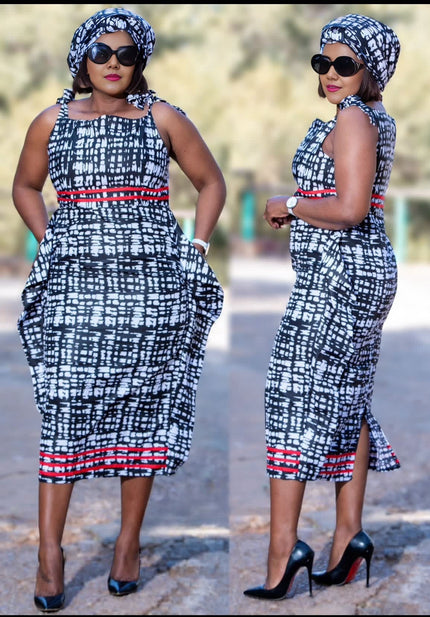 Sleeveless midi dress with blue-and-white geometric print and red contrast trim