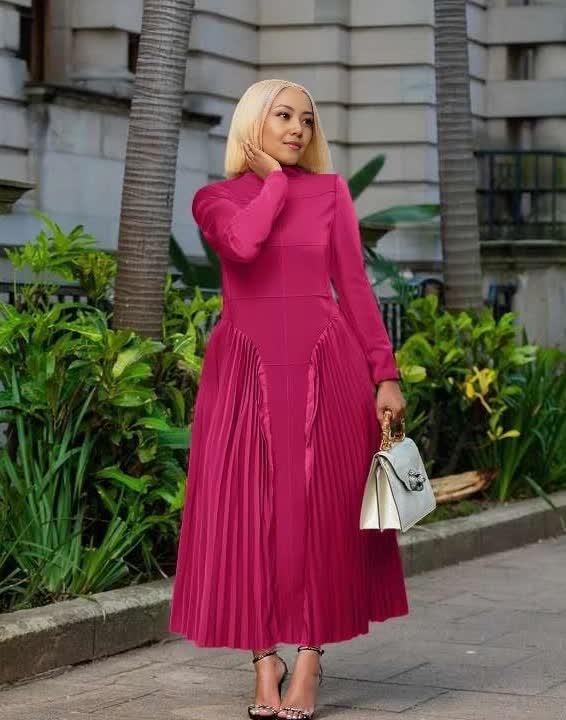 Magenta pleated midi dress with long sleeves and cinched stretch waist