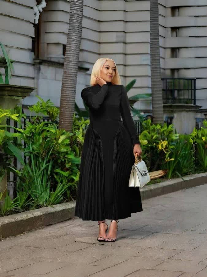Black pleated midi dress with long sleeves and cinched stretch waist
