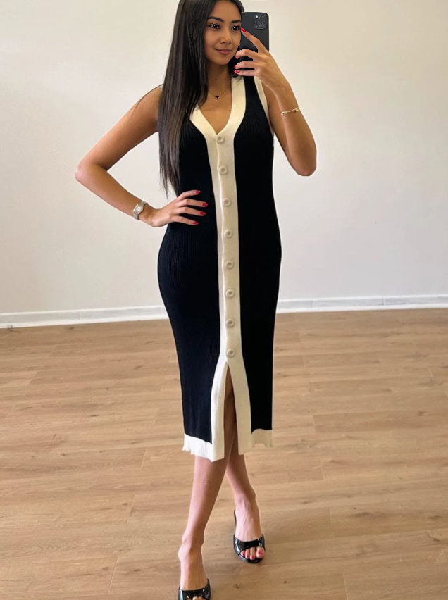 Sleeveless knit midi dress in black with cream contrast trim, button front, side slit