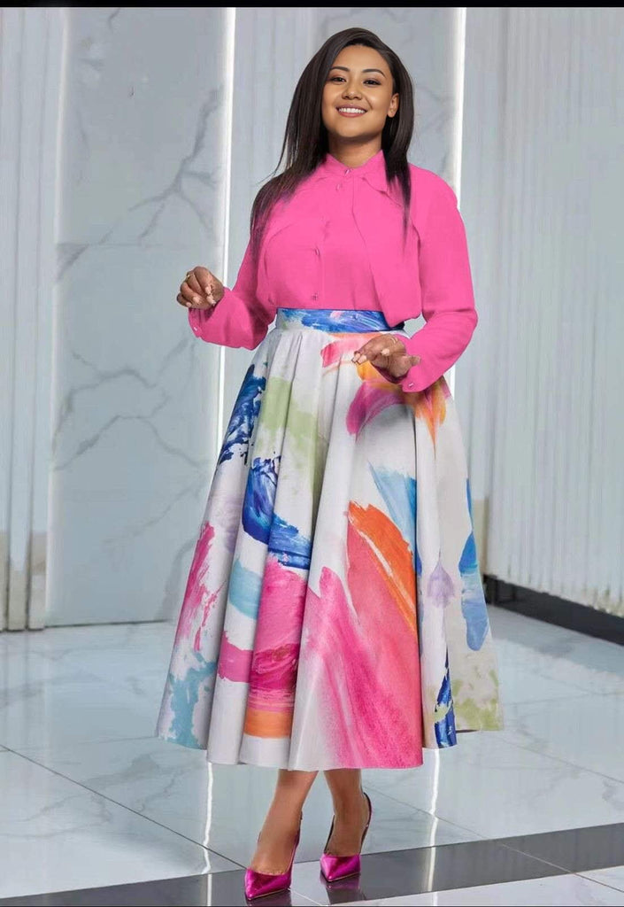 Hot-pink long-sleeve button shirt with colorful watercolor midi skirt