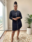 Dark navy pearl-button dress with flap collar, long sleeves, gold trim