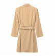 Tan long-sleeve wrap mini dress back view with tie waist