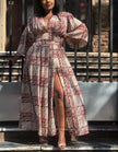 Long-sleeve maxi dress with V-neck and gathered waist, multicolor abstract print, high slit