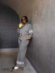 Grey zip-front jacket and wide-leg striped pants set