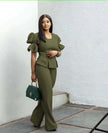 Army-green puff-sleeve twin set with cropped peplum top and wide-leg pants.