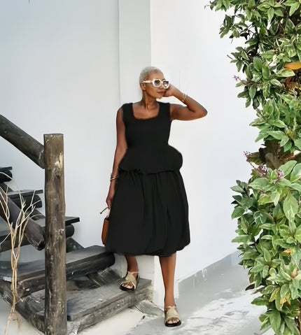 Black bubble-hem sleeveless midi dress, square neckline, tiered ruffle skirt