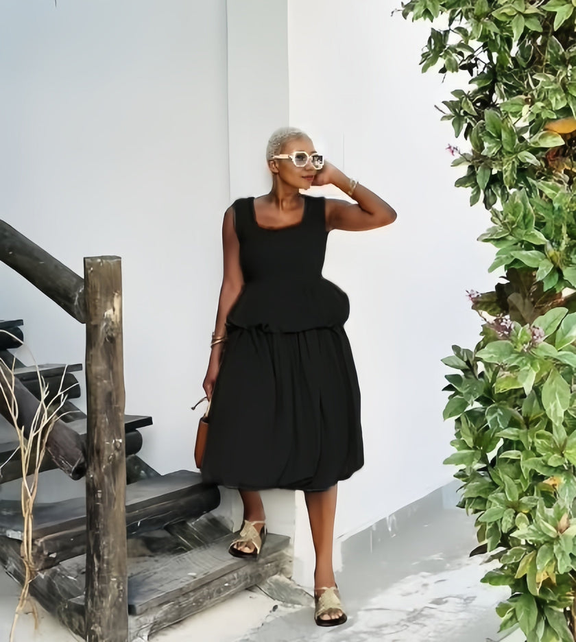 Black bubble-hem sleeveless midi dress, square neckline, tiered ruffle skirt