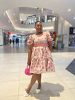 Rose-print belted puff-sleeve dress with ruffled skirt and bow waist detail