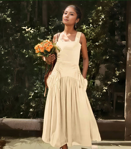 Beige sleeveless midi dress with square neckline and gathered tiered skirt