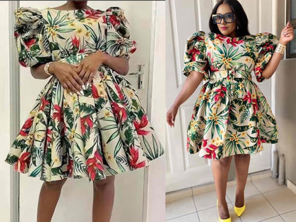 Tropical print puff-sleeve plus size dress with fitted waist and flared skirt, cream base