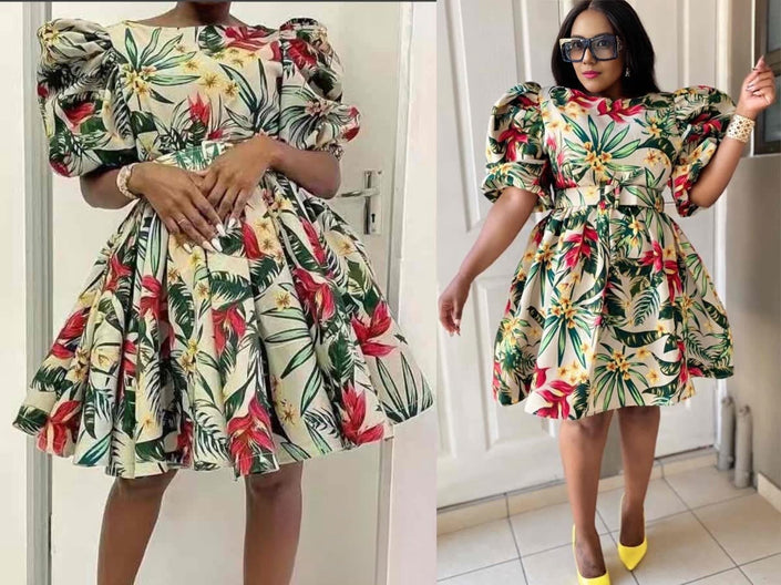 Tropical print puff-sleeve plus size dress with fitted waist and flared skirt, cream base