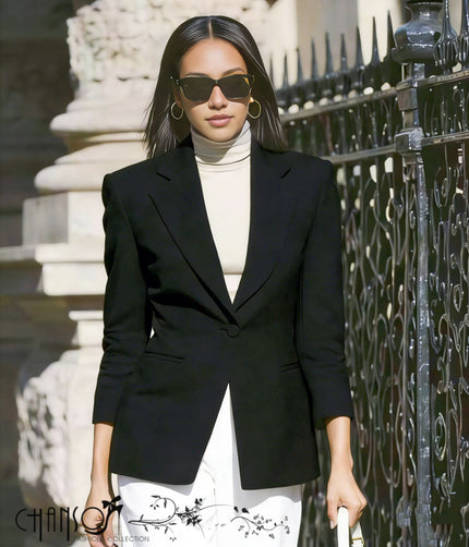 Black slim-fit tailored blazer jacket with button-front detail and structured lapels