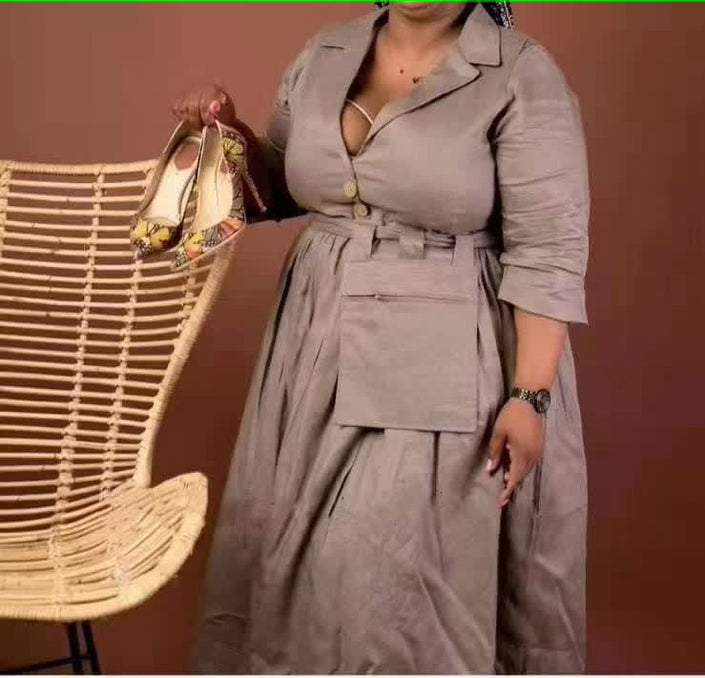 Rosy-brown belted midi dress with pointed collar, V-neck, and three-quarter sleeves